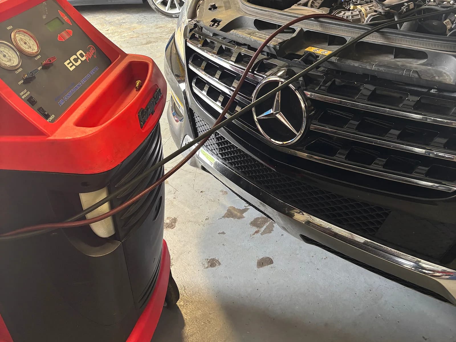 Mercedes connected to diagnostic equipment at Impact Auto Repair