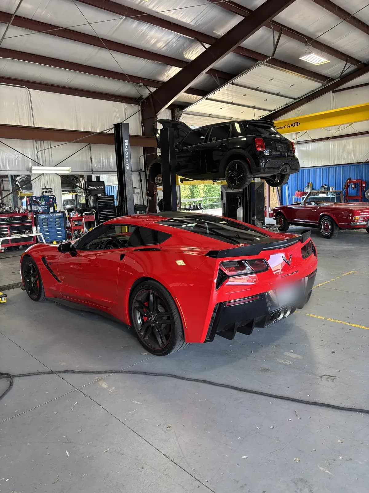 Corvette in the shop for performance service at Impact Auto Repair
